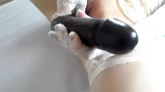 Pussy And Ass Filled By A Huge, Very Wide Black Vibrator