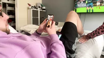 He Tries To Play Fifa While She Plays With His Cock