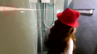 Nice Lady In The Shower In Wet Clothes And A Hat. Striptease Dancing In The Shower. 1