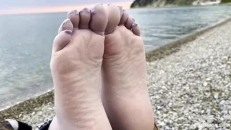 Feet Tease In Black And Grey Nylon Socks Wiggling Toes At The Seashore