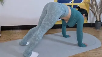 Beautiful Busty Girl Hip Stretching Yoga