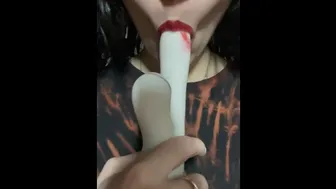 Pretty Girl Sucking On Her White Toy