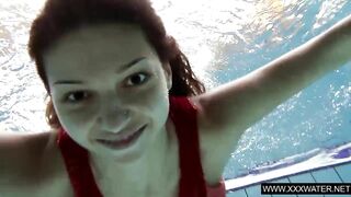 Sexy Brunette Anna In Red Dress Swimming