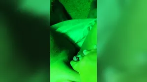 Here Masturbating With A Green Light And Using Some Lotion My Clit Is Saying Hi