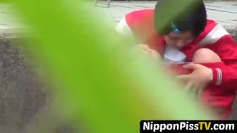 Short Haired Japanese Darling In Tracksuit Pees In The Road