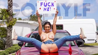 Gorgeous Exhibitionist Lilly Hall Sits On The Hood Of Her Car With A Big Sign That Says - Fuck Me