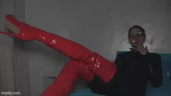 A Girl In Latex Boots And Catsuits Smoking