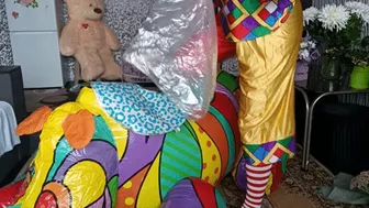 Clown Girl Sit On Rhino And Blow Myllar Balloons